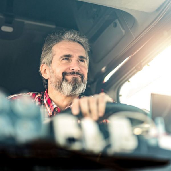 Happy Looking Tow Truck Driver 600x600