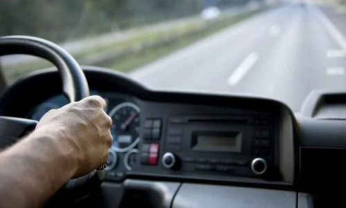 Tow Truck Driver Driving Image
